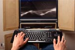 Logitech Cordless MediaBoard Pro voor de PS3 en de Cordless Vantage Headset